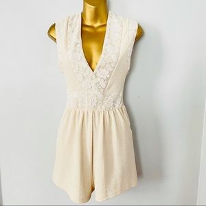 Zara embroidered cream romper deep v size small